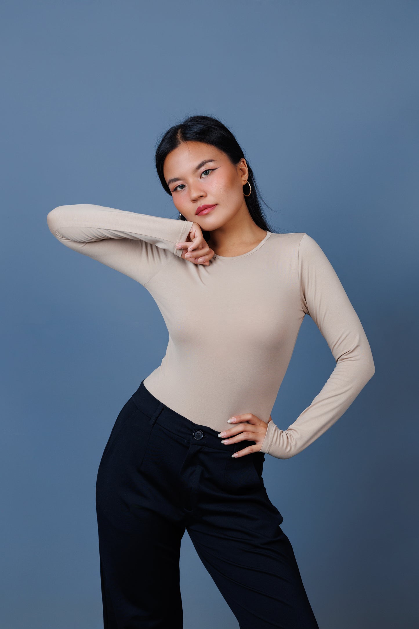 Crewneck full sleeve bodysuit, bodysuit, #bodysuit, ladies bodycon top, one-piece top, swimwear, smartwear, innerwear, laconic bodysuit, cream, nude, beige, model, onlinenepal, nepalibrand, sexytop, partywear, dress, body-hugging