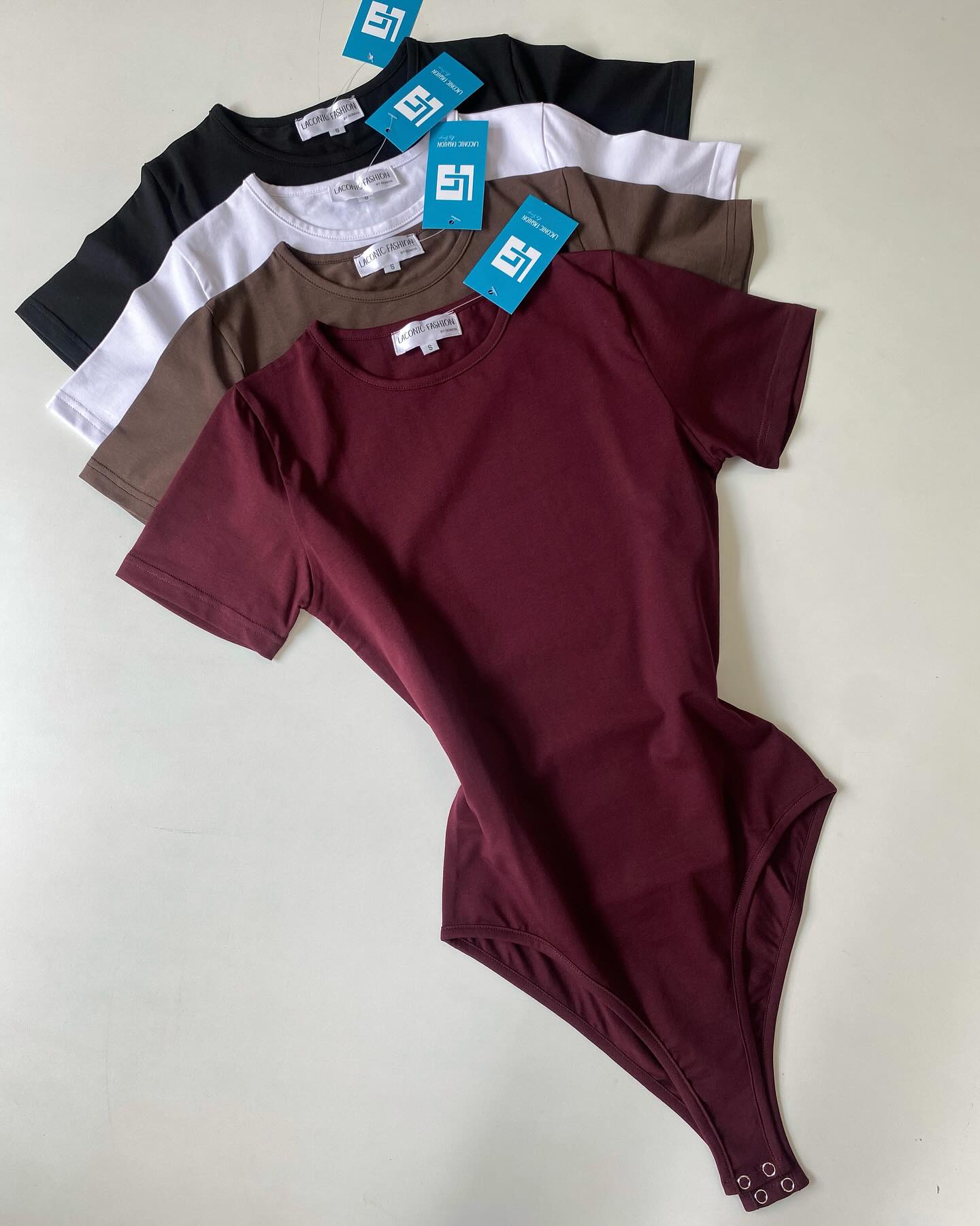 Crewneck Half - Sleeve Bodysuit