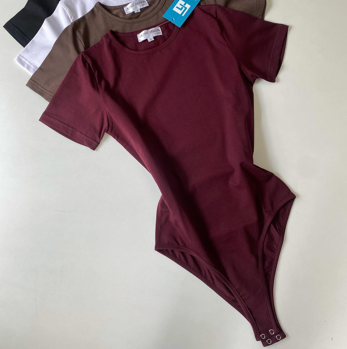 Crewneck Half - Sleeve Bodysuit