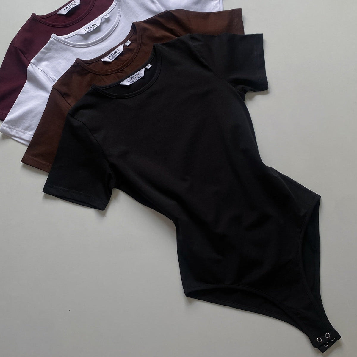 Crewneck Half - Sleeve Bodysuit