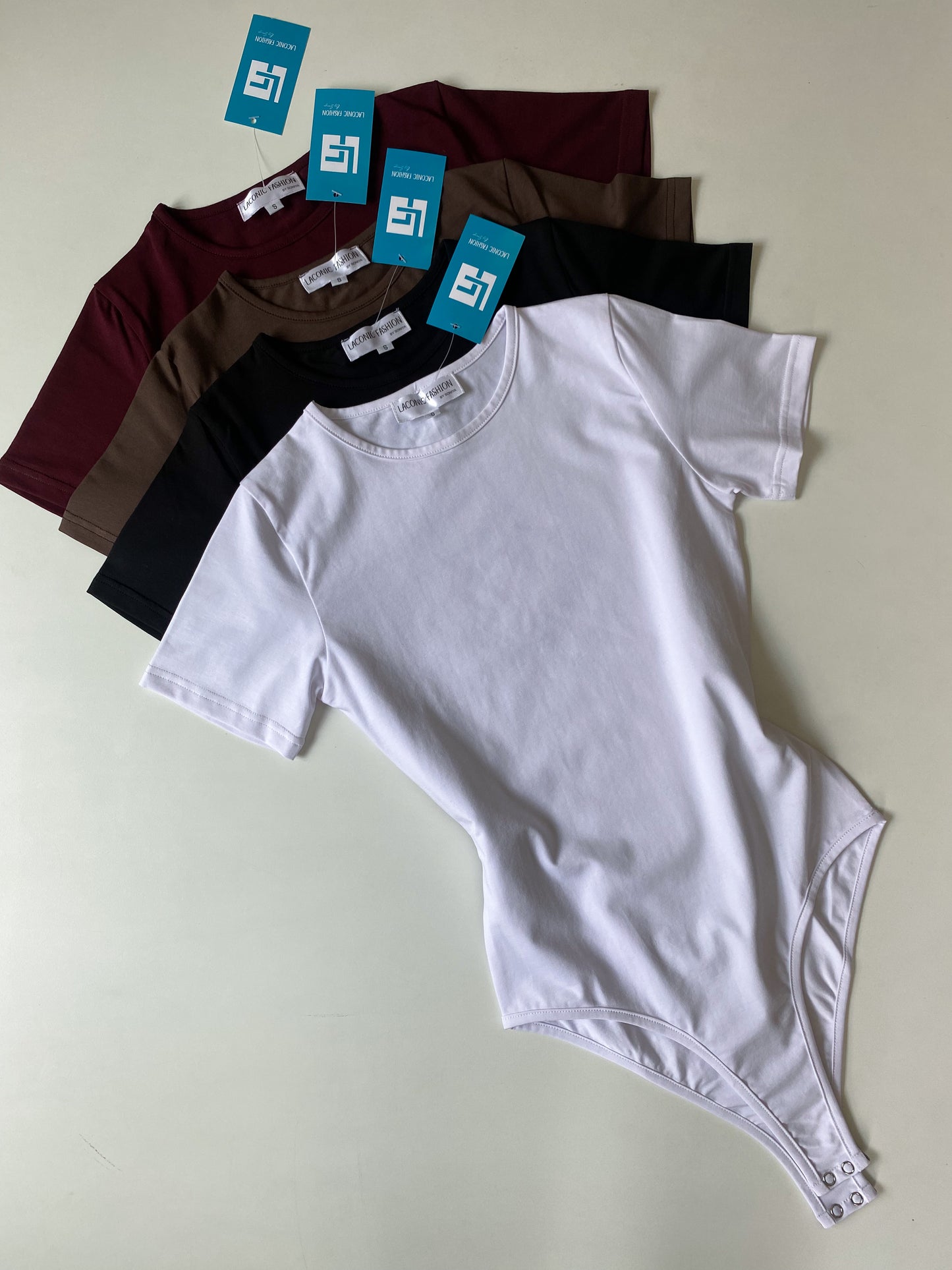 Crewneck Half - Sleeve Bodysuit