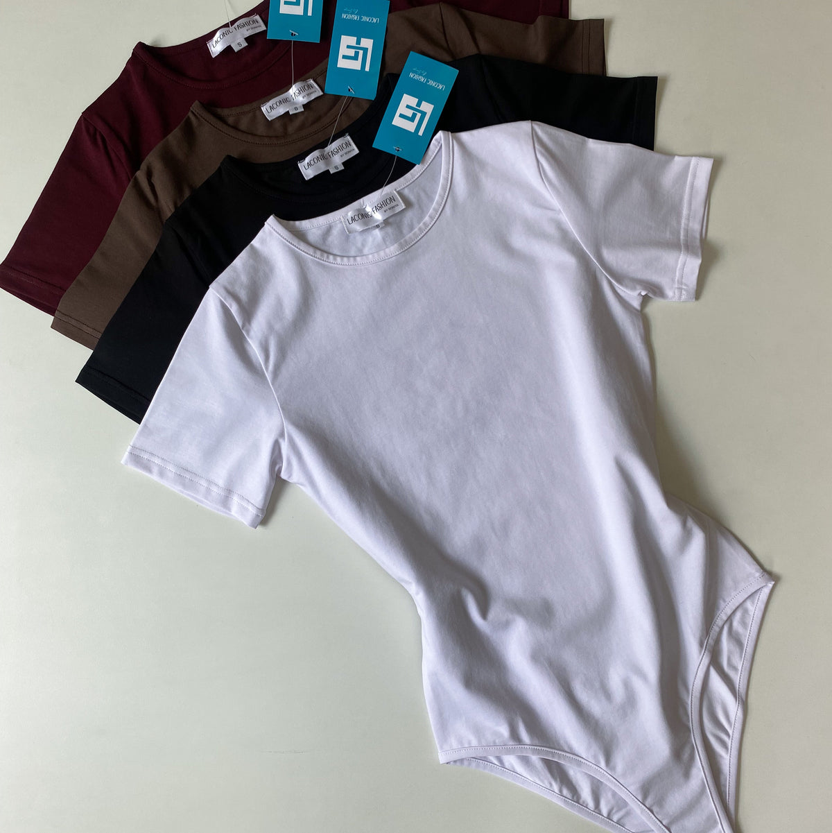 Crewneck Half - Sleeve Bodysuit