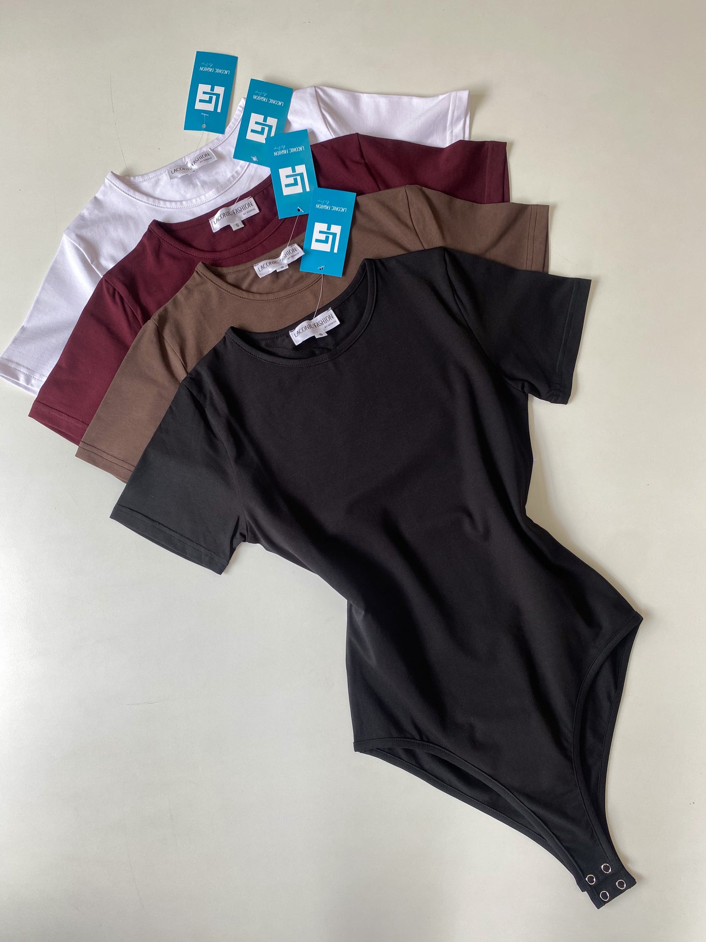 Crewneck Half - Sleeve Bodysuit