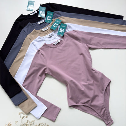 Long-sleeve bodysuits from Laconic Nepal 
